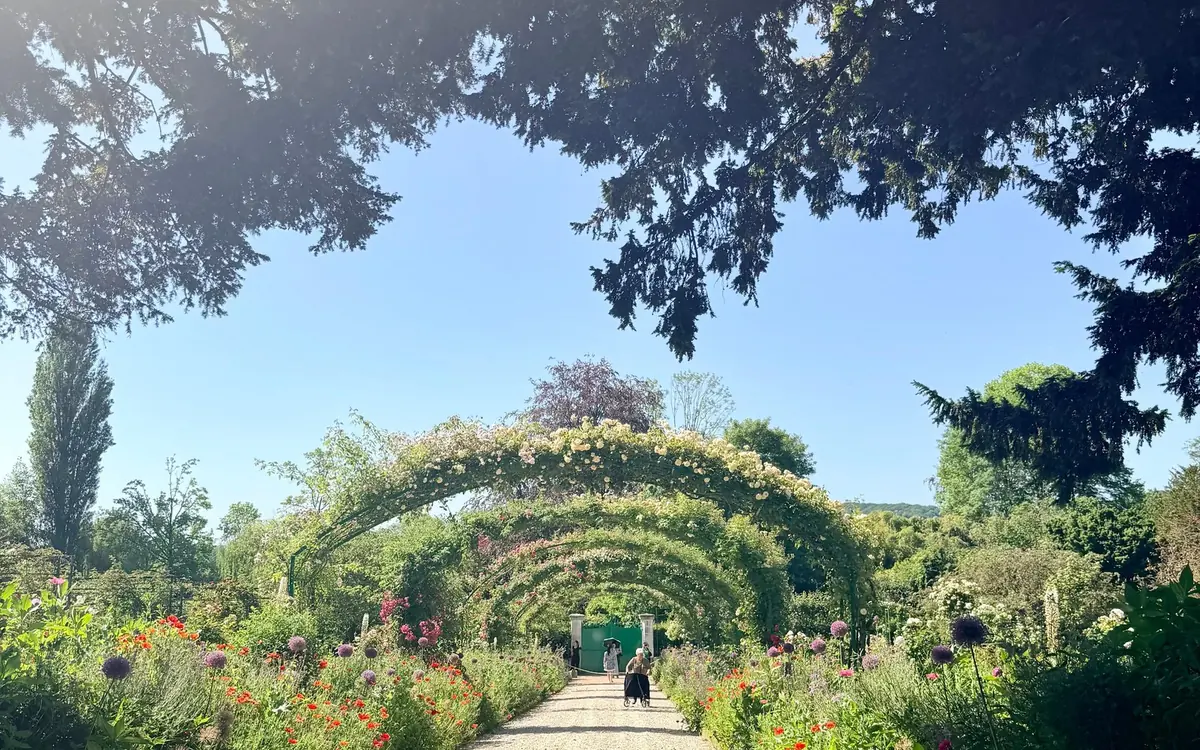 The flower-arched central path of Monet’s garden at Giverny