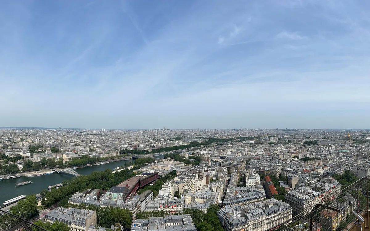 Paris rooftops and the Seine seen from high on the Eiffel Tower