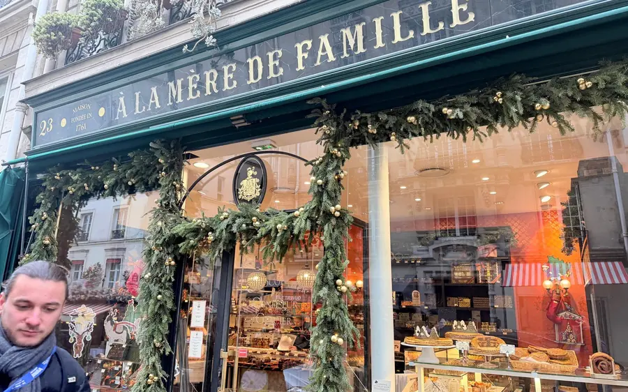 An old confectioner’s shop front with a decorated window