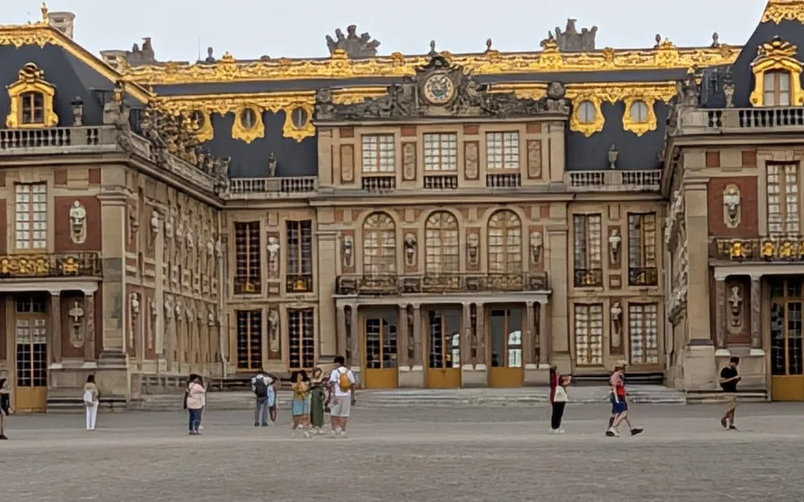 The gilded front courtyard facade of the Palace of Versailles